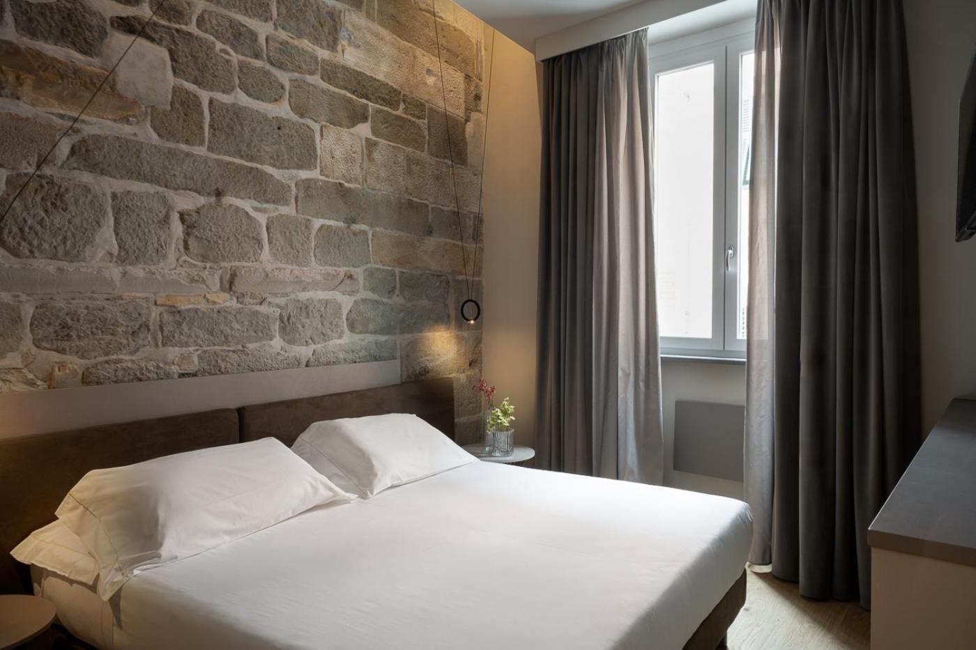 Hotel Ilaria Lucca Bagian luar foto